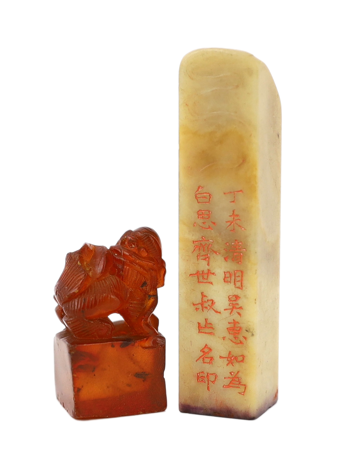 A 19th century Chinese amber ‘lion-dog’ seal and a 20th century soapstone seal